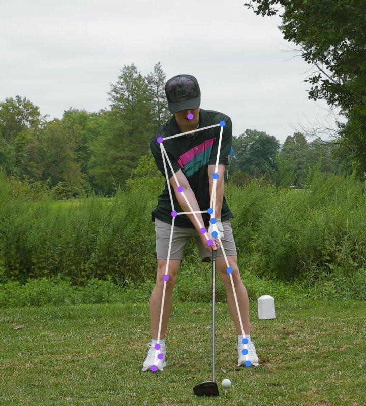 A golfer at address with a driver, filmed face on, with the tracked skeleton drawn over the video.